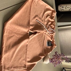 Under Armour wide leg pants, SZ L, NWT.  Peach color.